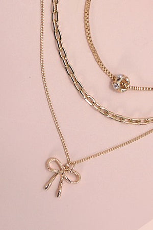 Multi Layer Pearl Bow Charm Necklace